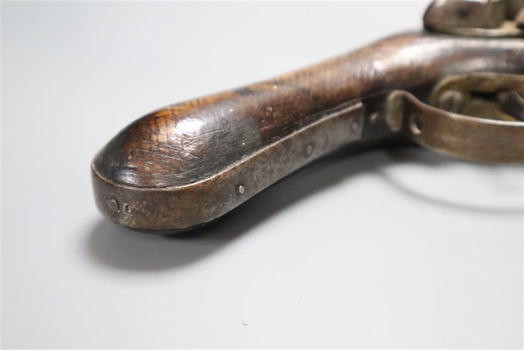 A late 18th century flintlock holster pistol, with walnut stock, 37cm long